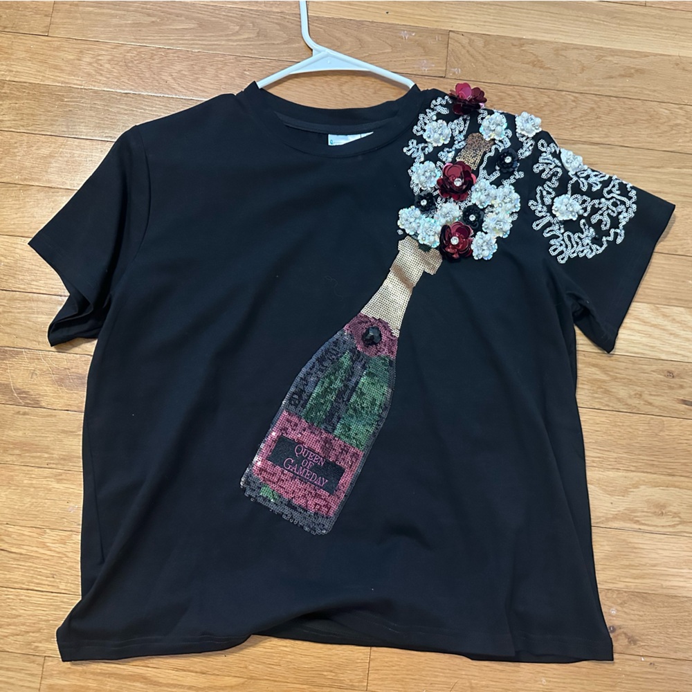 QUEEN OF SPARKLES Black Tee with Champagne Bottle Design